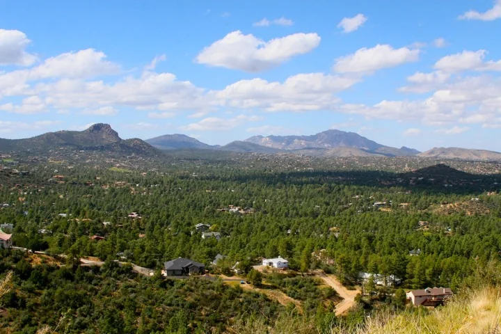 Prescott and its surrounding mountain landscape, including Thumb Butte
