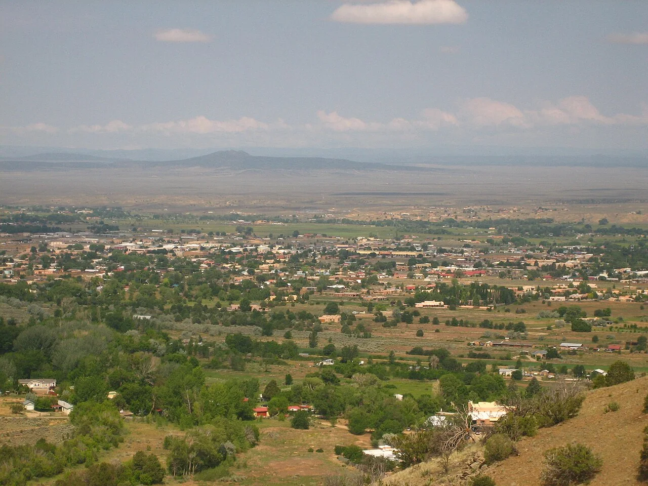 Taos and its surrounding landscape viewed from a mountain trail
