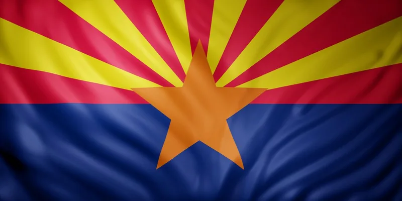 Arizona state flag with red and gold rays, a copper star, and a blue lower half